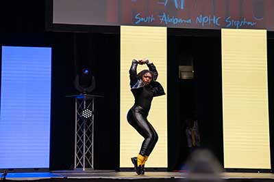 Student performing at step show.