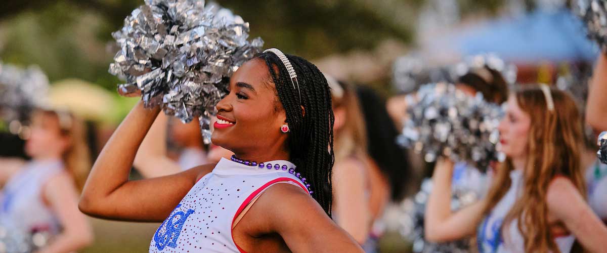 Colorguard marching at Mardi Gras.