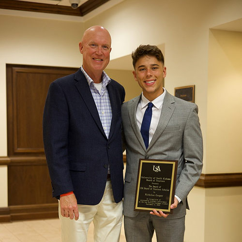 Nicholas Cooper with an Award