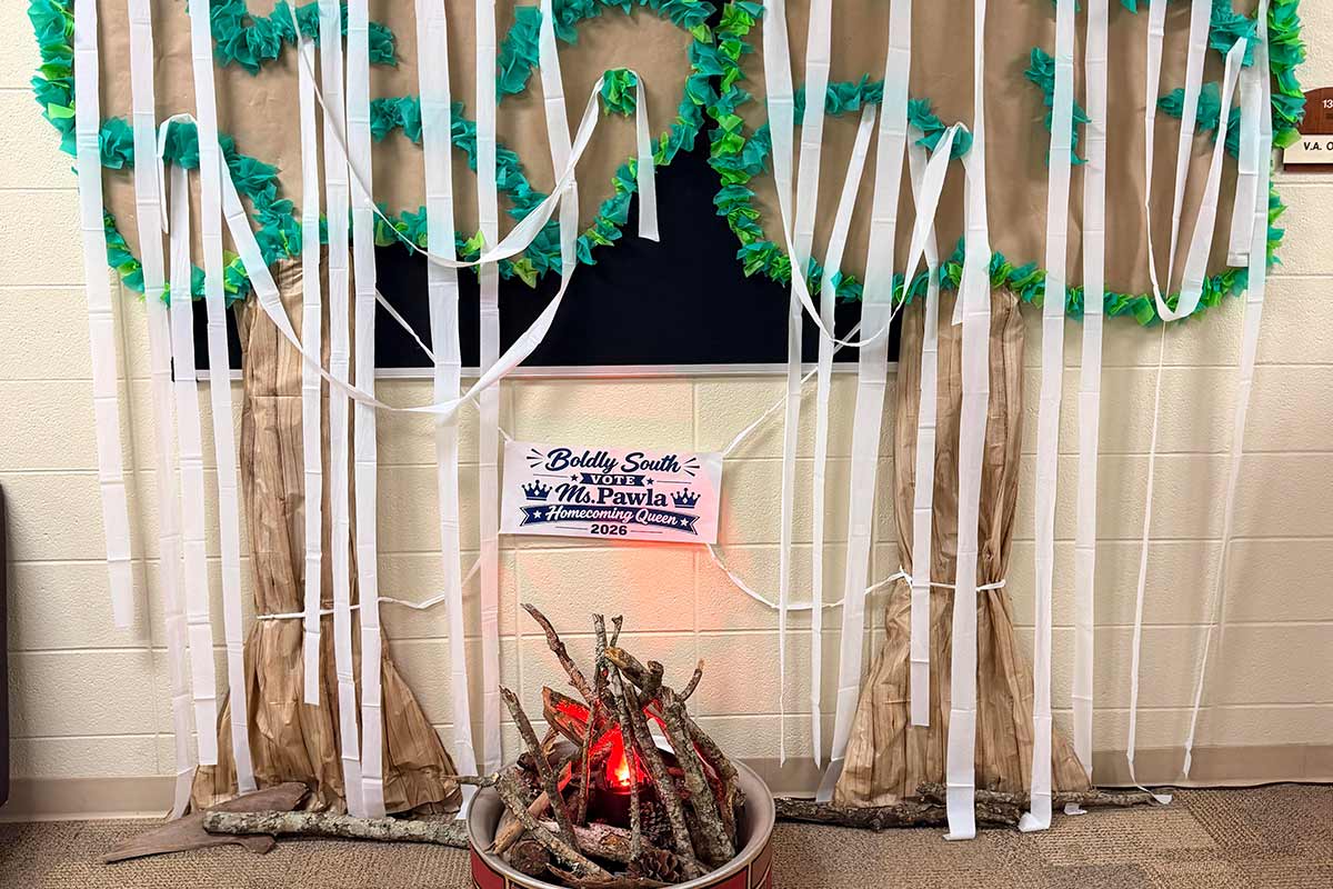 Trees with toilet paper and fire decorations.