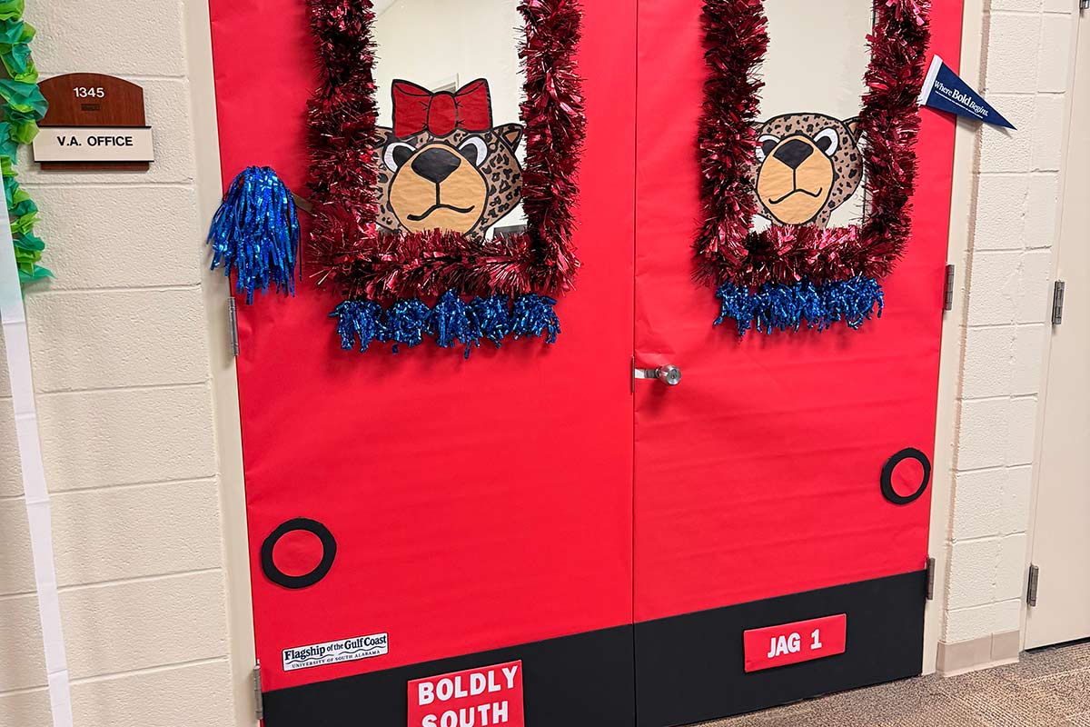 Doors decorated with Southpaw and Ms Pawla in trolley.